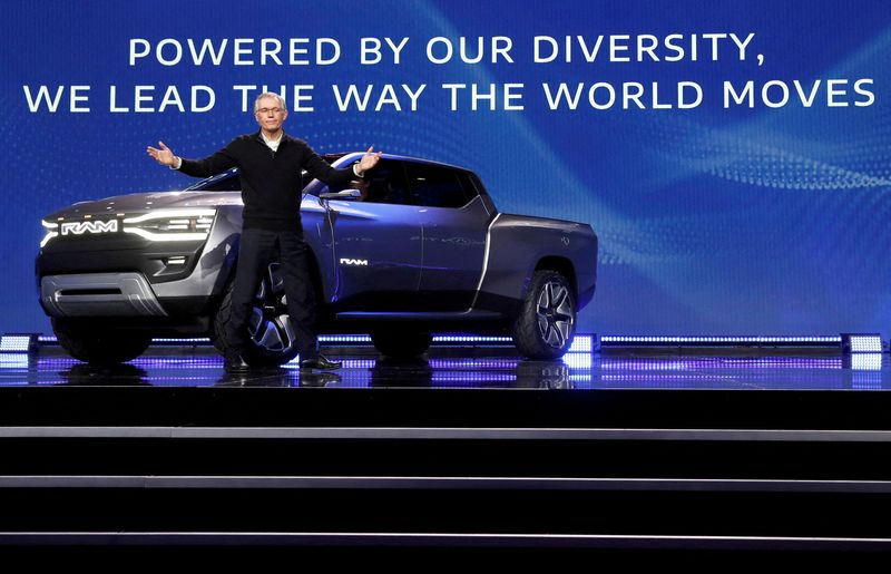 © Reuters. FILE PHOTO: Stellantis CEO Carlos Tavares poses in front of the Ram 1500 Revolution electric concept pickup truck during a Stellantis keynote address at CES 2023, an annual consumer electronics trade show, in Las Vegas, Nevada, U.S. January 5, 2023.  REUTERS/Steve Marcus