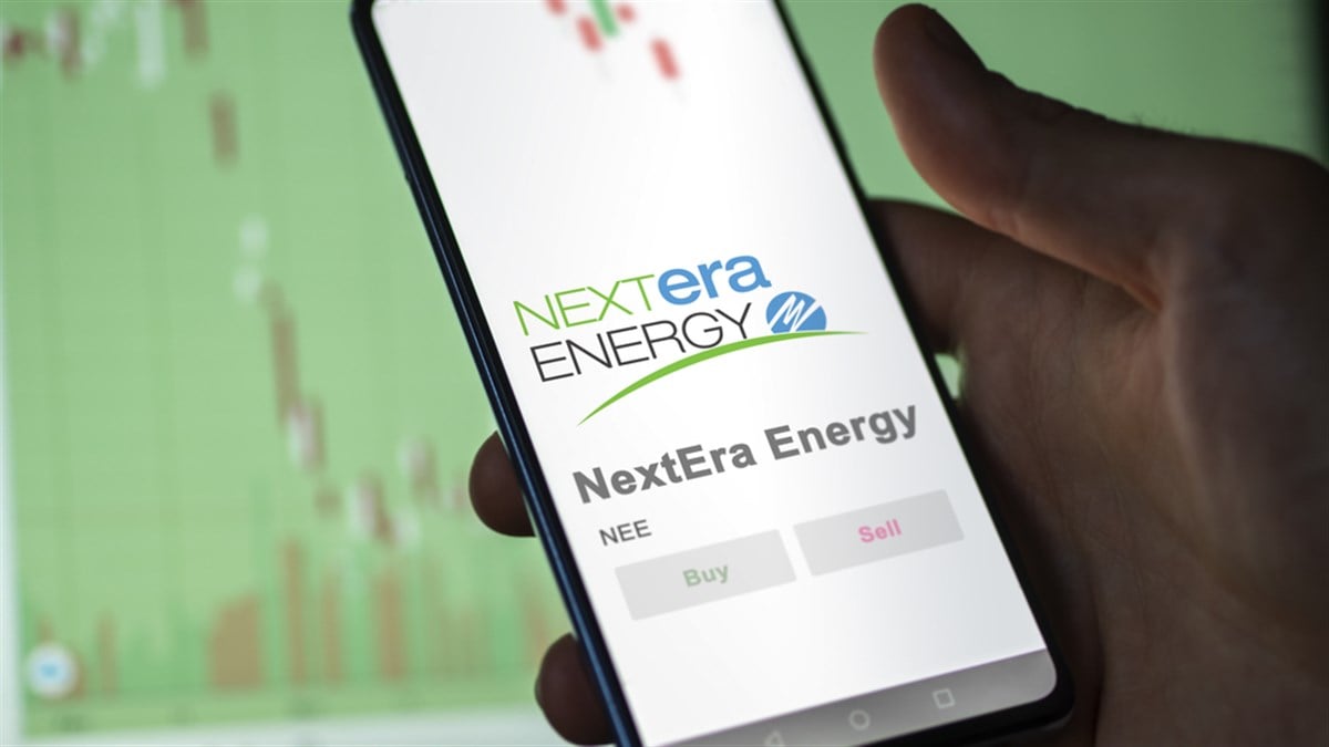NextEra Energy stock buy or sell on smartphone screen