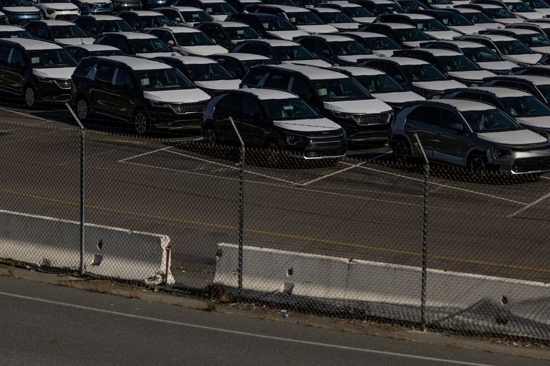 © Reuters. FILE PHOTO: New vehicles are seen at a parking lot in the Port of Richmond, at the bay of San Francisco, California June 8, 2023. REUTERS/Carlos Barria/ file photo © Reuters. FILE PHOTO: New vehicles are seen at a parking lot in the Port of Richmond, at the bay of San Francisco, California June 8, 2023. REUTERS/Carlos Barria/ file photo