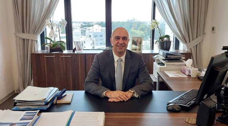 Dr. George Theocharides at his CySEC office in Nicosia, last month