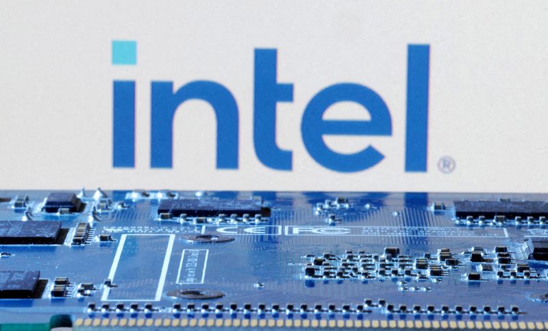 © Reuters. FILE PHOTO: Intel logo is seen near computer motherboard in this illustration taken January 8, 2024. REUTERS/Dado Ruvic/File Photo/File Photo