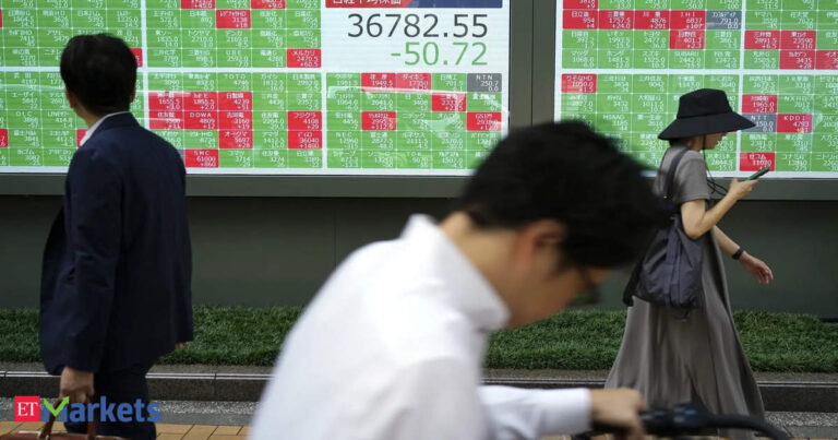 Japan's Nikkei books best week since mid-August, but BOJ caps gains