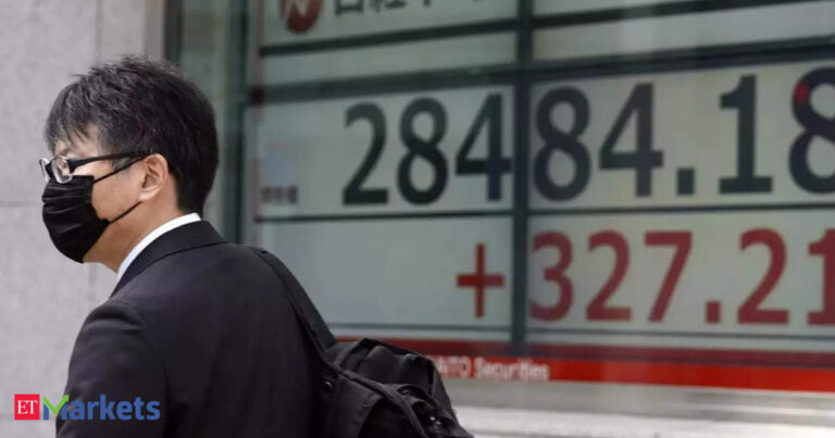 Asian stocks, bonds rally as Federal Reserve cuts rates