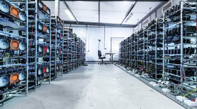 The picture shows a Bitcoin mine, a place where BTC are mined