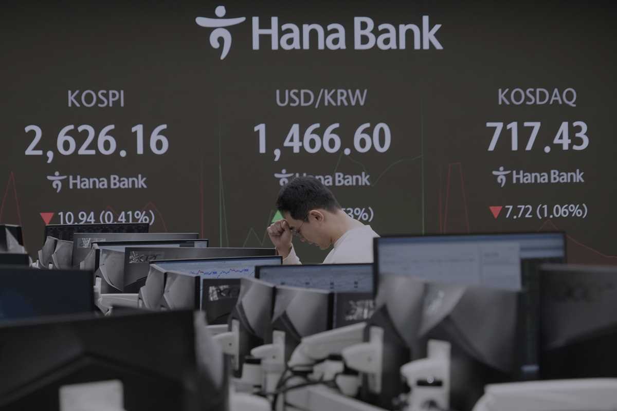 Stock market today: Asian shares are mostly lower after tech-fueled gain on Wall Street