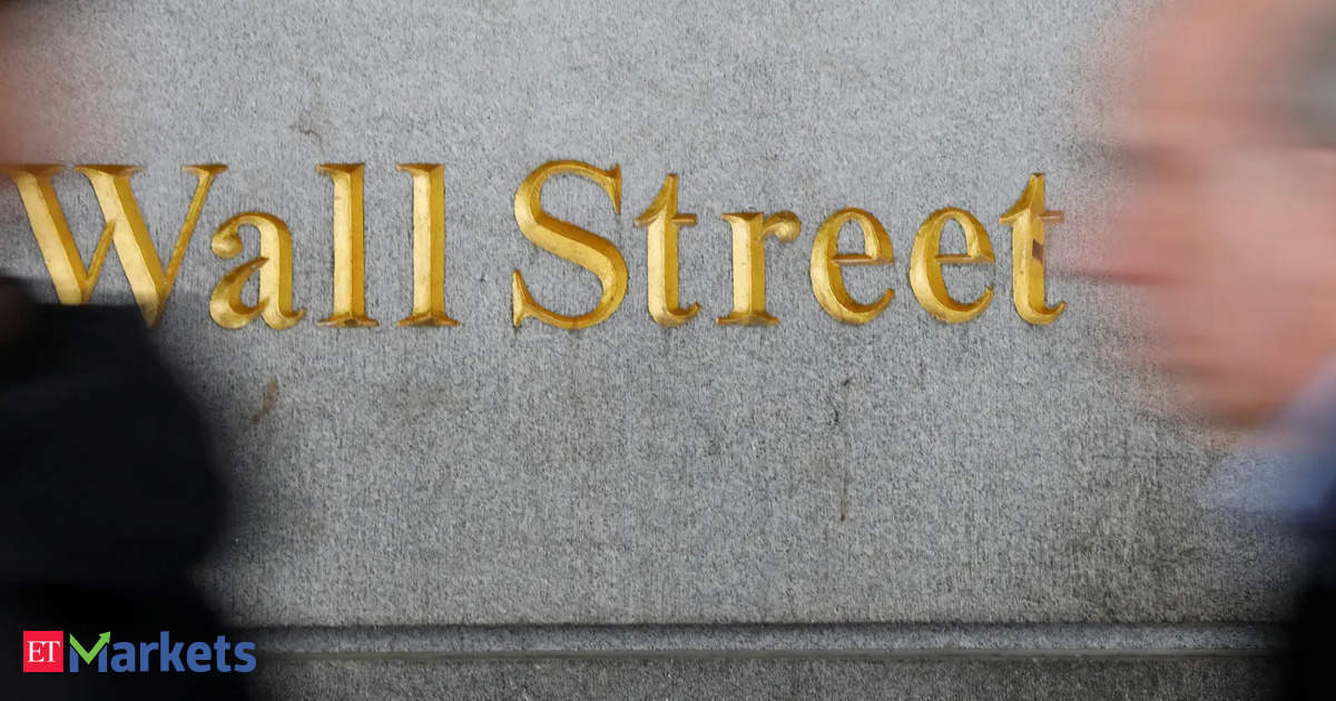 Wall Street closes lower as Trump sets 25% tariffs, manufacturing data dips