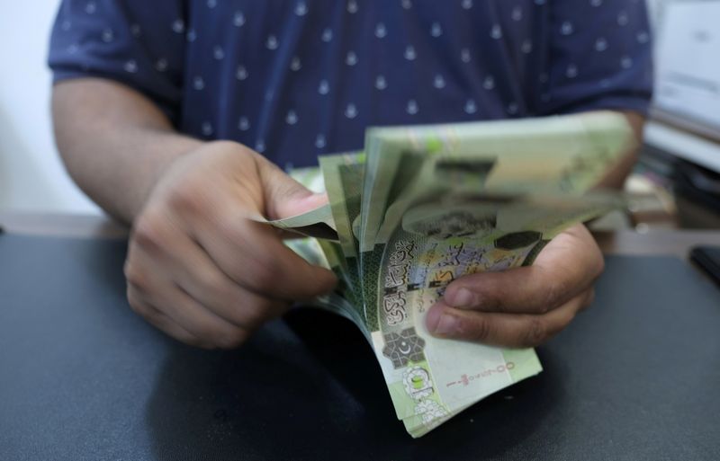 Libya devalues currency for first time in four years