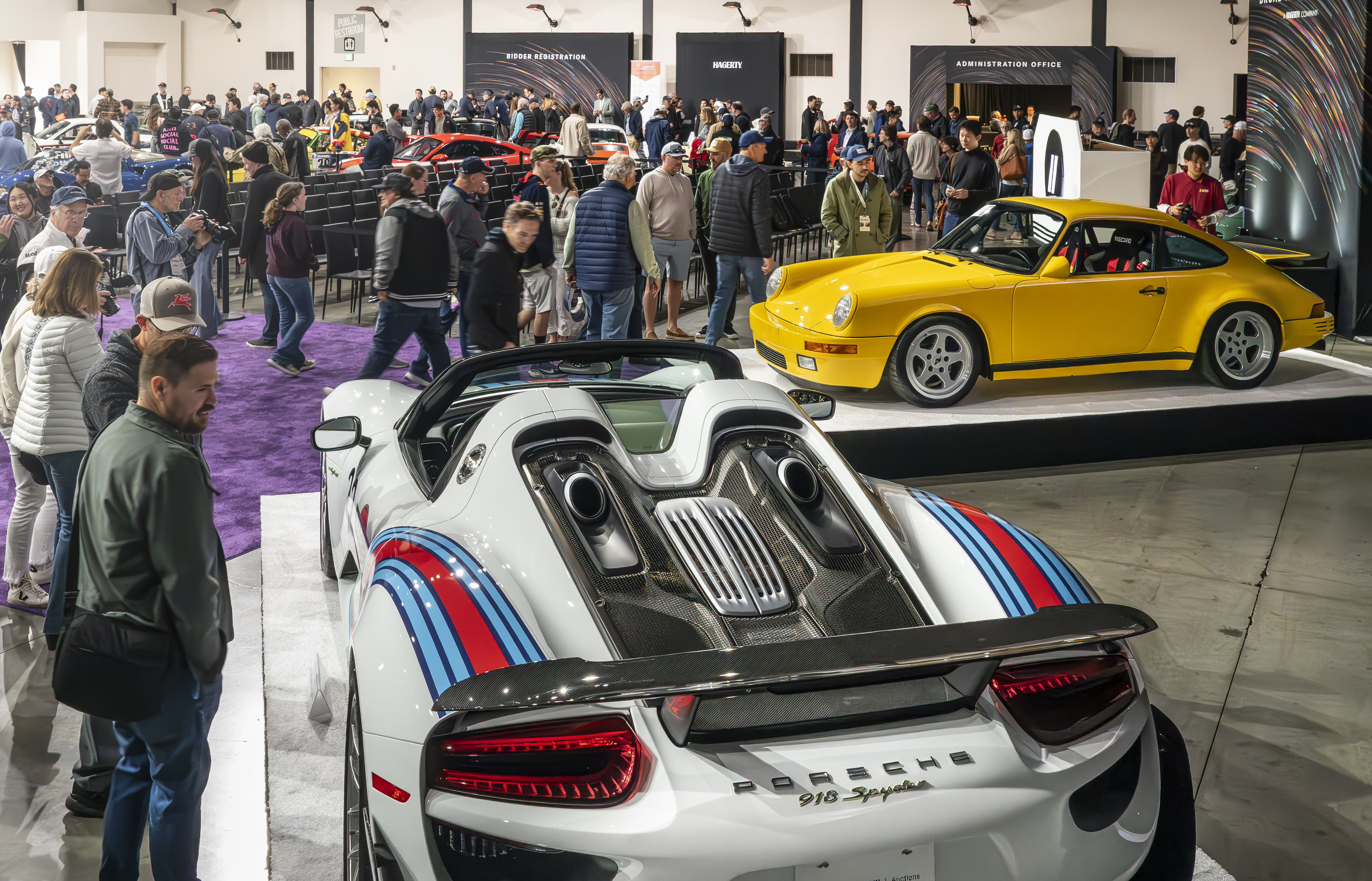 The top-selling RUF CTR Yellowbird and Porsche 918 Spyder Weissach greet attendees at Broad Arrow's 2025 Porsche Air|Water Auction Credit - Robin Adams / Courtesy of Broad Arrow Auctions