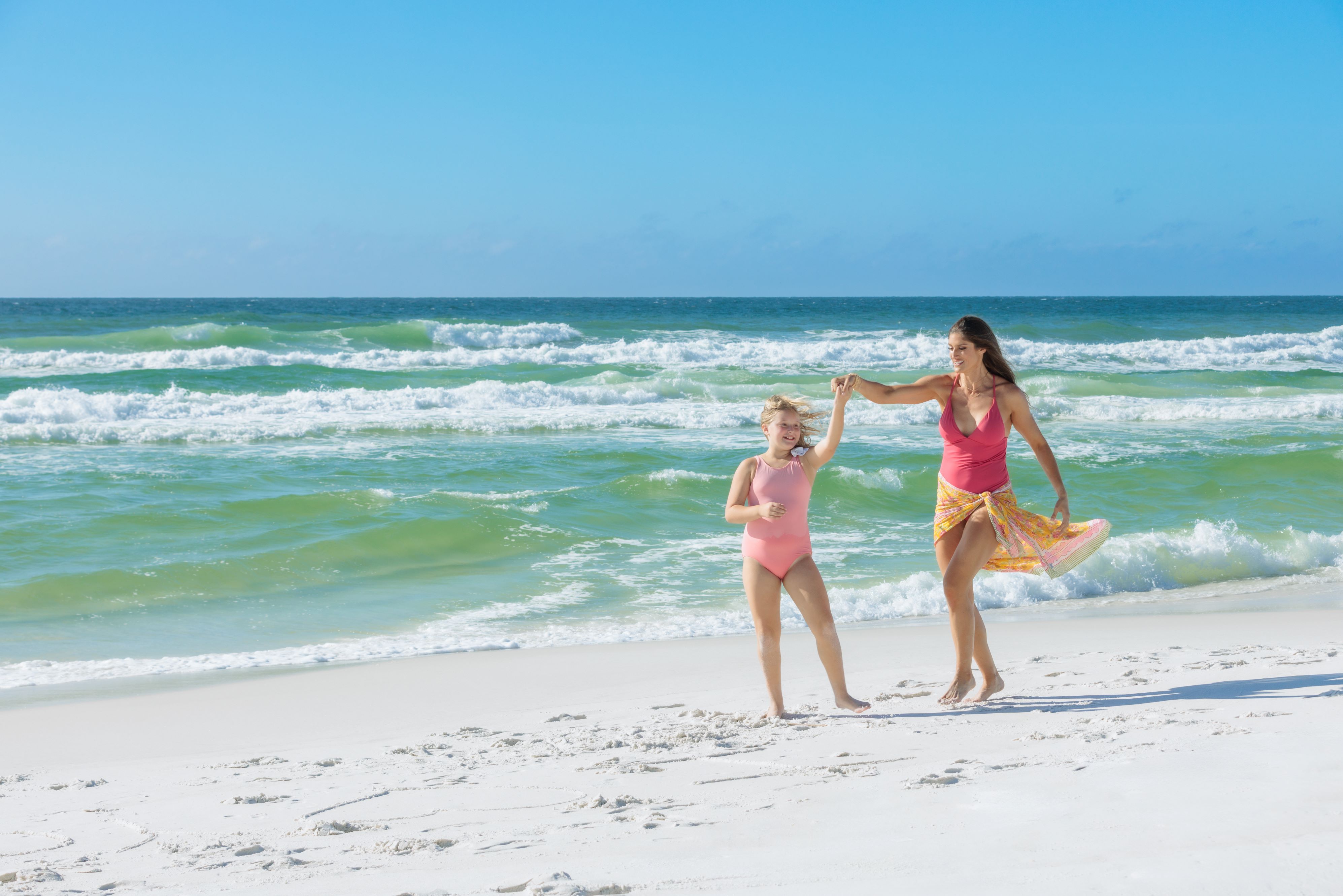 Mom enjoying a moment with her daughter on the beach in Destin, Fla.
