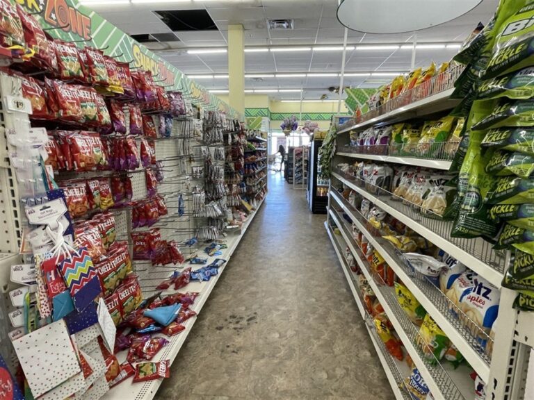 Augusta, Ga USA - 01 26 23: Dollar Tree retail store interior candy and snack aisle