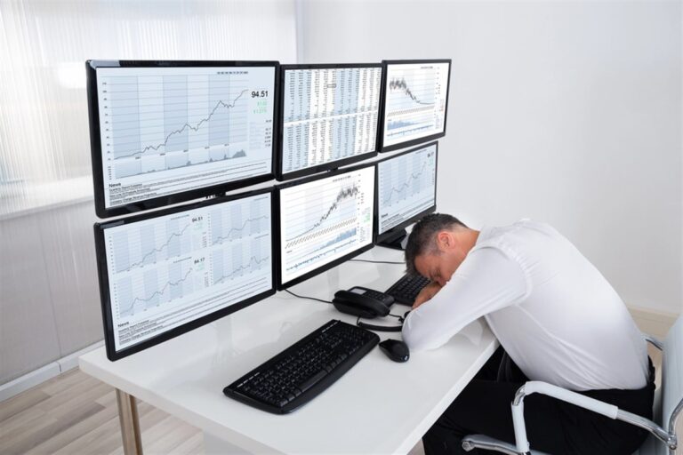 Photo of a sleeping stock trader, boring stocks.