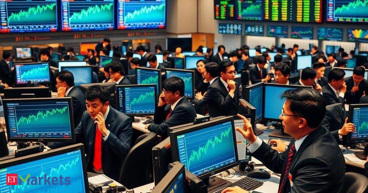 Asian stocks edge lower after mixed Fed signals