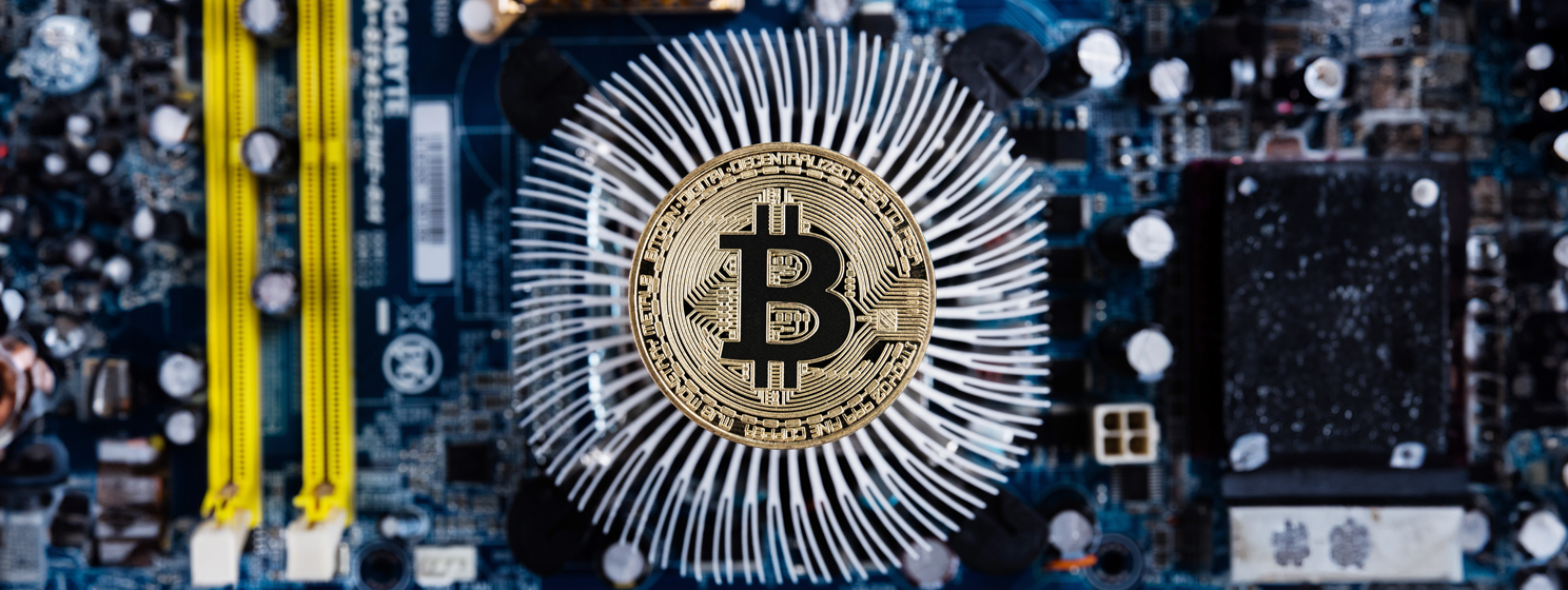 Gold bitcoin with microcircuits on a blue background