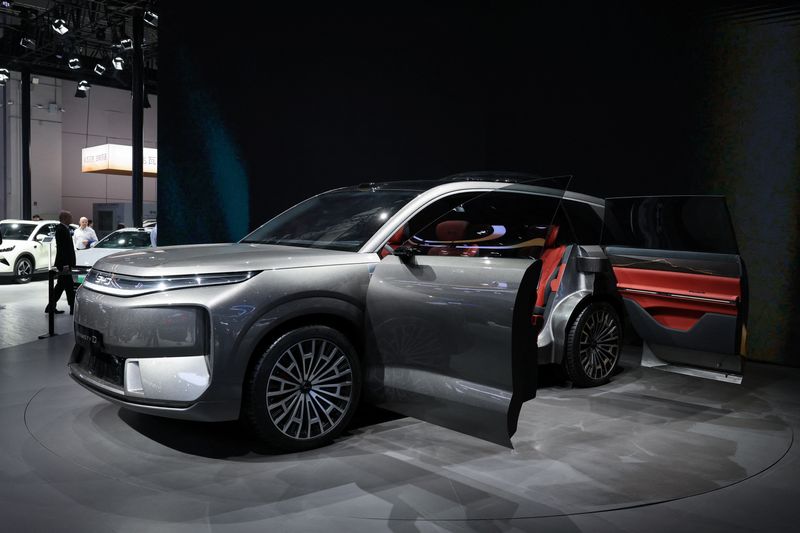 Exclusive-China’s BYD cuts 2025 sales target by 16%, sources say, a sign its white-hot growth is cooling