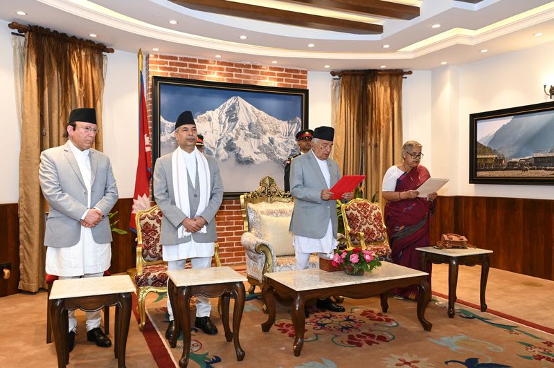 Nepal sets March elections after naming interim prime minister