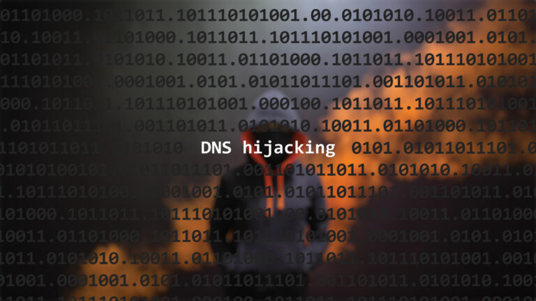Cyber attack dns hijacking text in foreground screen, anonymous hacker hidden with hoodie in the blurred background. Vulnerability text in binary system code on editor program.