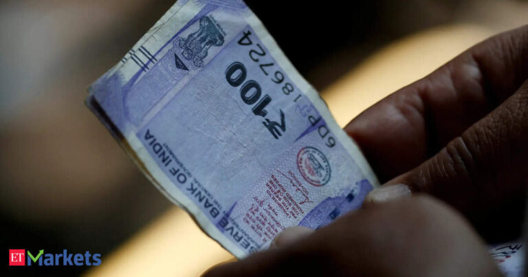 Rupee ends nearly flat, wedged between competing merchant flows