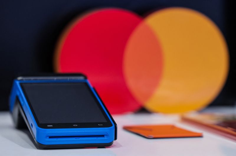 Visa and Mastercard near settlement with merchants, would lower fees, WSJ reports