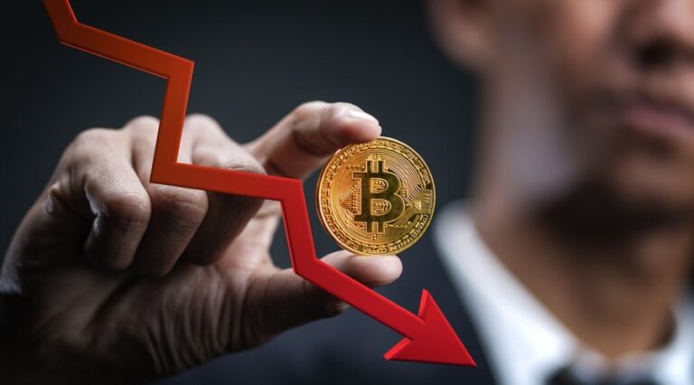 Decreasing Value of Bitcoin. Businessman Holding Bitcoin With Red 3D Arrow Down