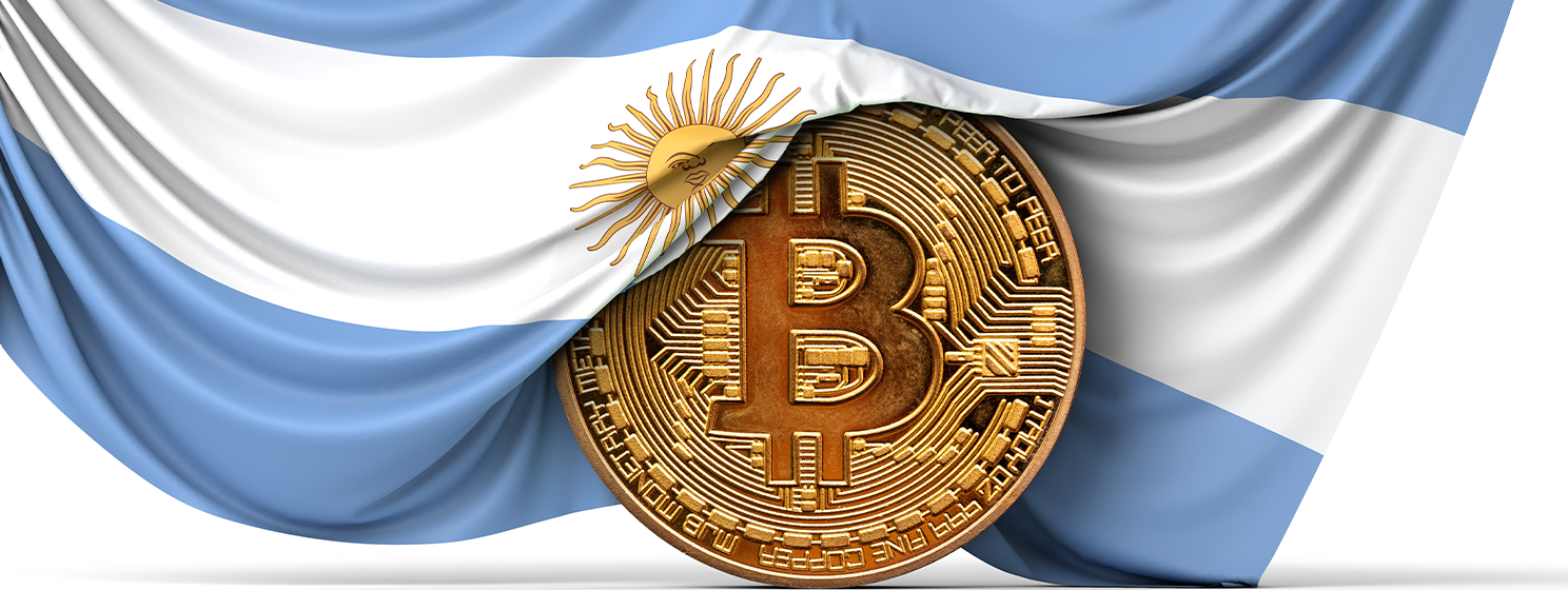 Argentina flag draped over a bitcoin cryptocurrency coin