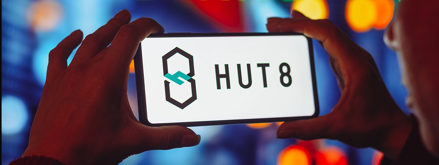Hut 8 Mining logo seen displayed on a smartphone screen.