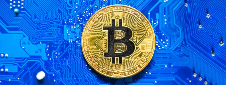 Remove BG Save Share Sample Bitcoin on the background of a computer board.