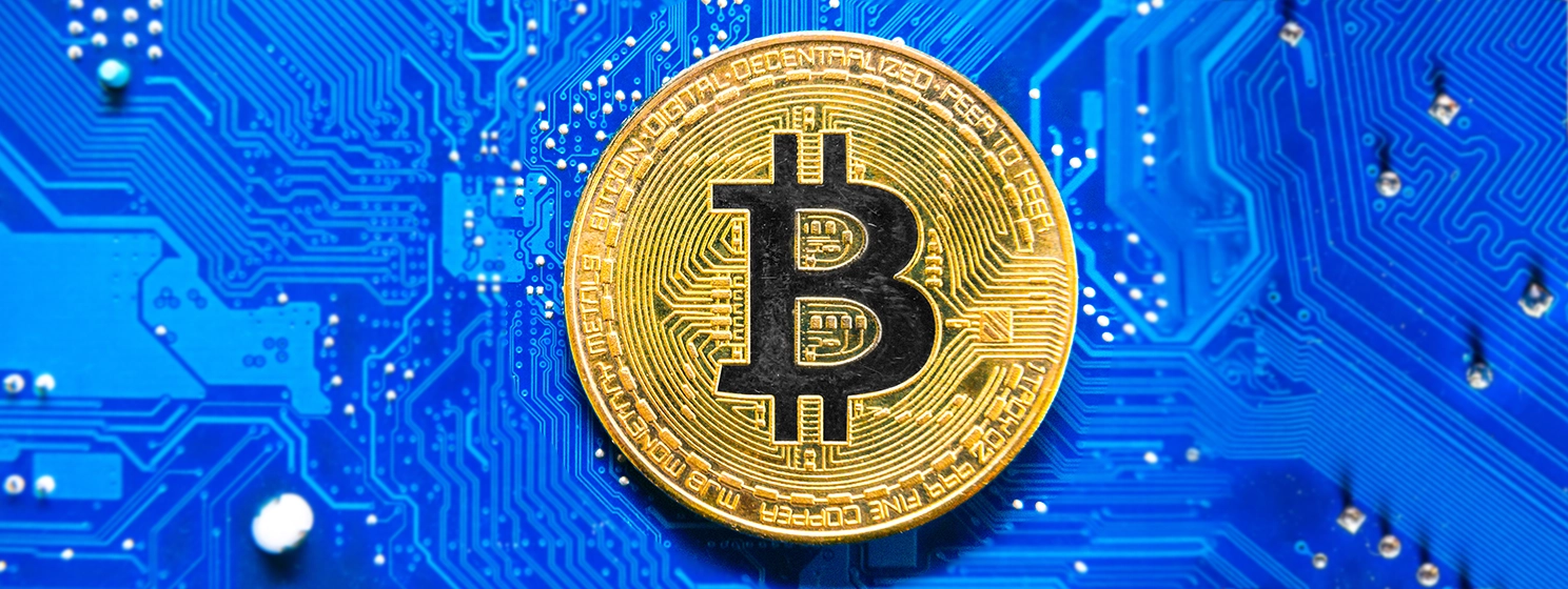Remove BG Save Share Sample Bitcoin on the background of a computer board.