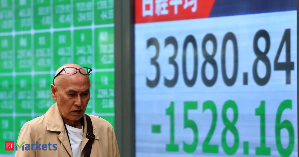 Japan's Nikkei sinks as tech shares track US peers lower