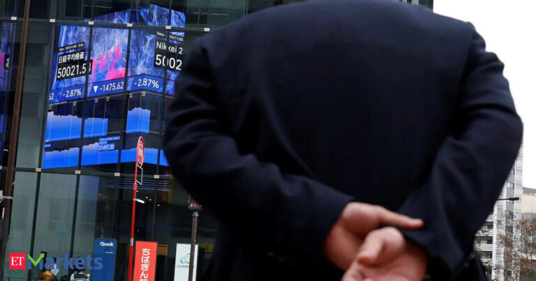 Japan's Topix gauge touches record high on easing debt concerns