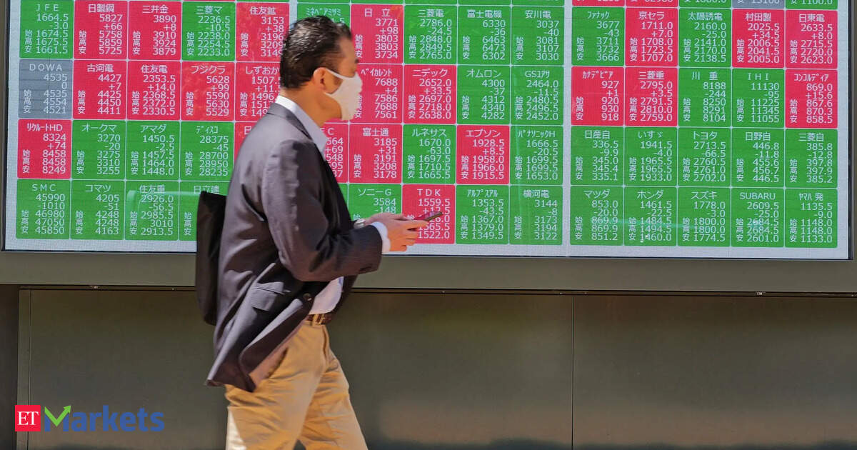 Japan's Topix index touches record high in tentative trade before Fed, BOJ