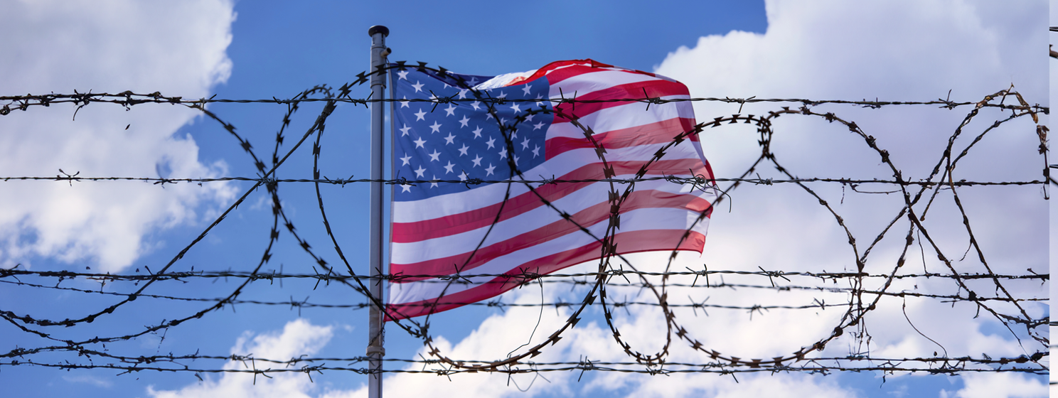 USA Border with American Flag and barbed Wire concept
