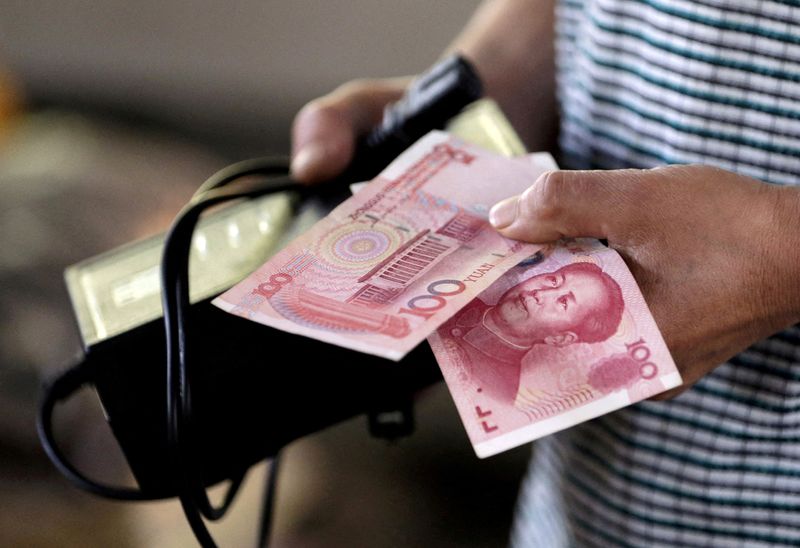 Yuan heads for longest weekly winning streak against dollar in 13 years