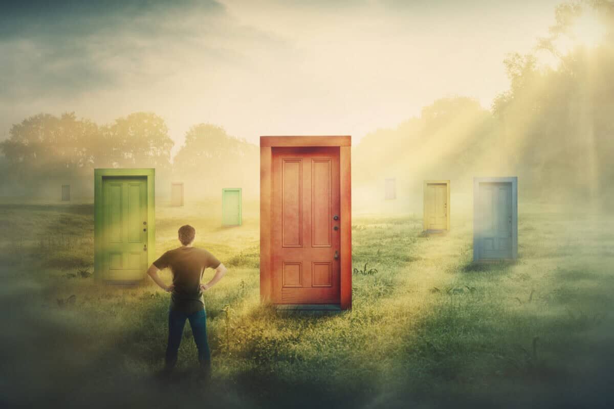Canadian investor contemplating U.S. stocks with multiple doors to choose from.