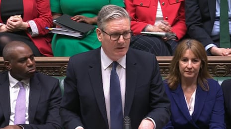 Starmer and Badenoch clash in parliament over Peter Mandelson – video