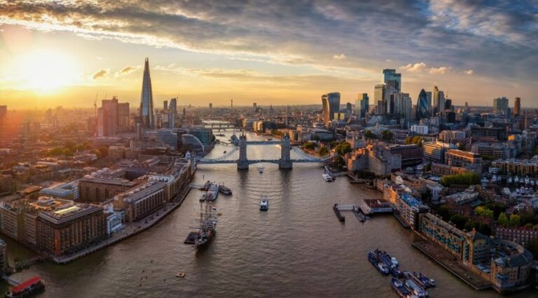 The view of the skyline of London, England, with Tower Bridge, River Thames and City skyscrapers