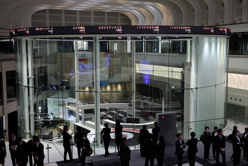 Japan’s Nikkei hits record high as chip-related shares jump