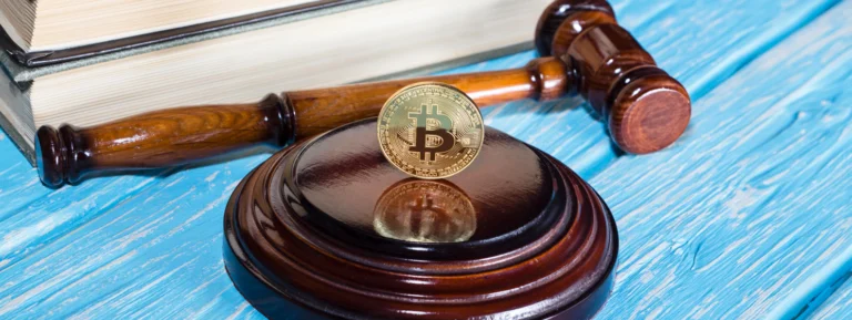 Judge's hammer and bitcoin gold coinJudge's hammer and bitcoin gold coin banner
