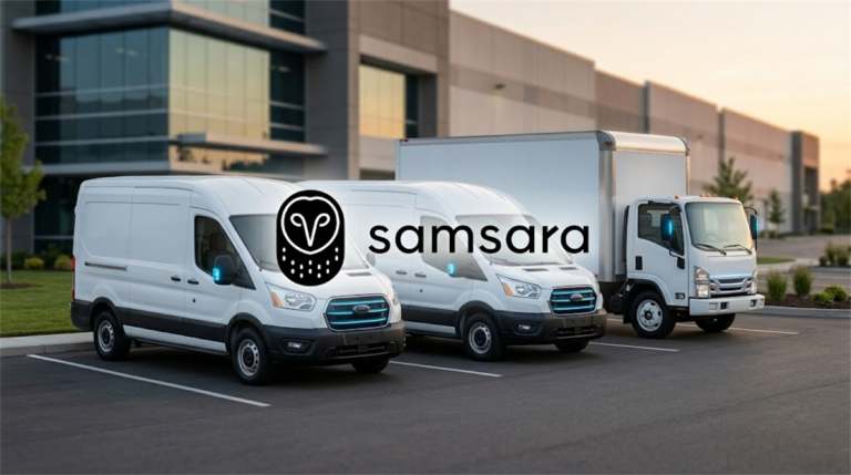Samsara logo overlaid on three white commercial fleet vehicles parked outside a warehouse facility.