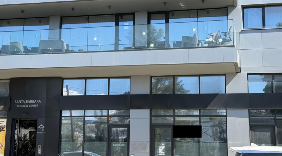 Bullet hole marks on the facade of the first floor of Santa Barbara Business Centre in Limassol